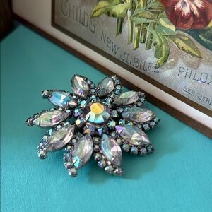 Elegant Silver Floral Brooch